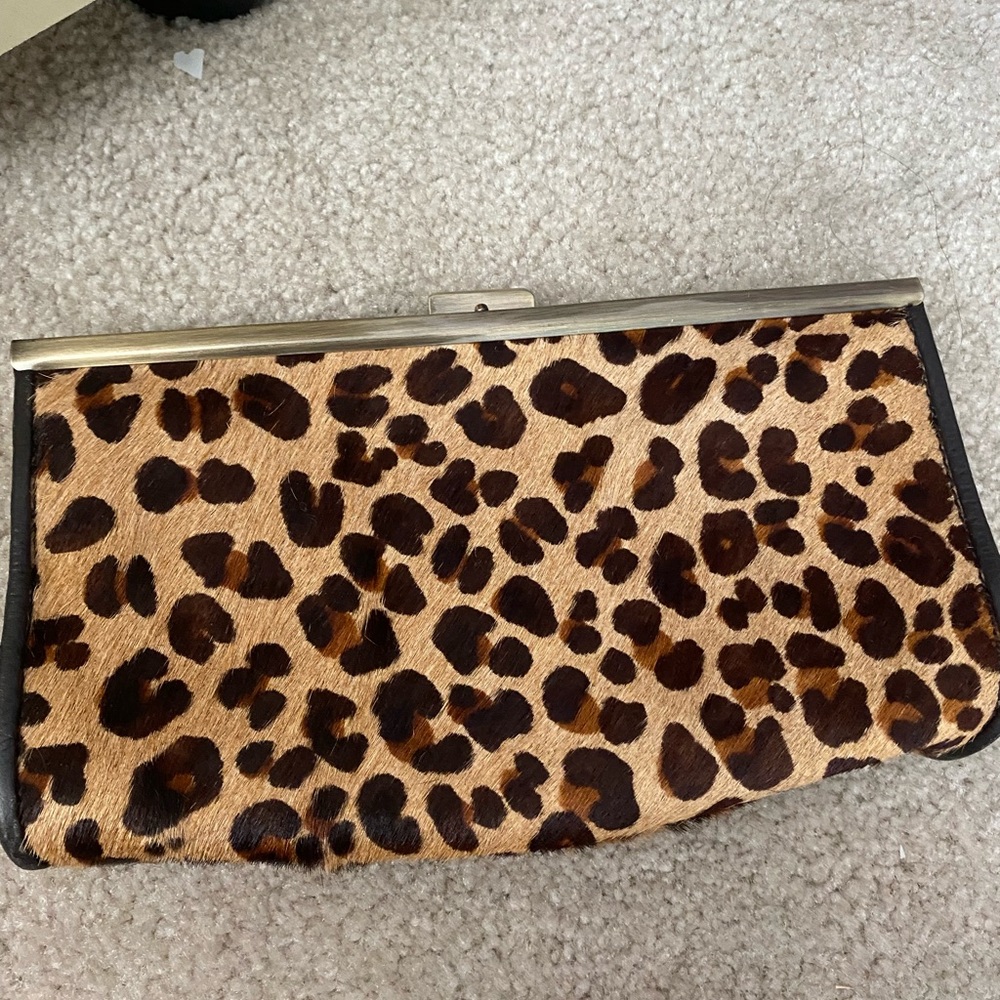 Small Express cow skin leopard print clutch
